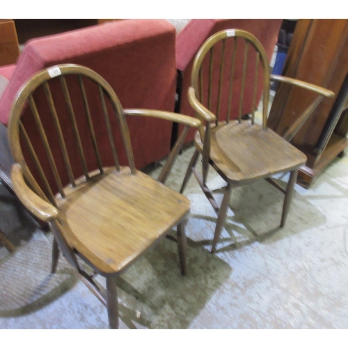 605 - Pair of Ercol stick back open armchairs, backs stamped  F.182, 290, (2)