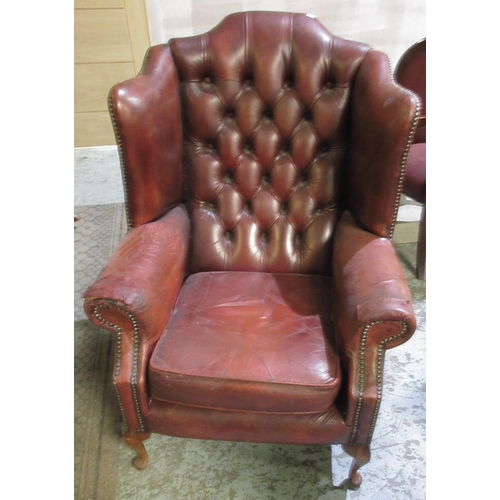 610 - Geo.111 style wing back arm chair, red leather upholstered with loose cushion on cabriole legs, W80c... 