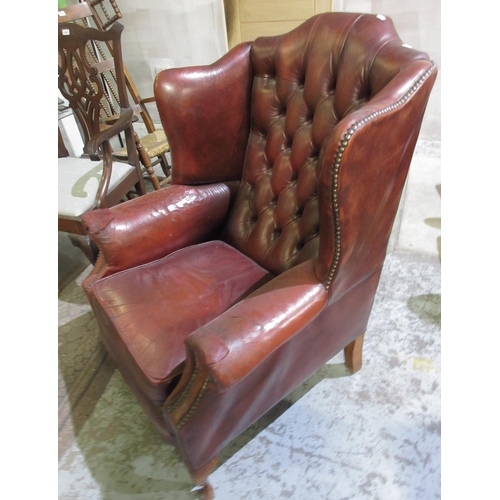 610 - Geo.111 style wing back arm chair, red leather upholstered with loose cushion on cabriole legs, W80c... 