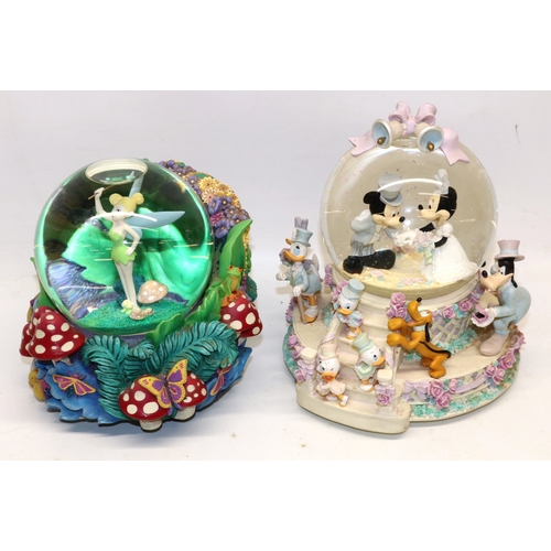 331 - Two Disney musical snow globes, Tinkerbell and Mickey and Minnie's wedding, max. H20.5cm (2)