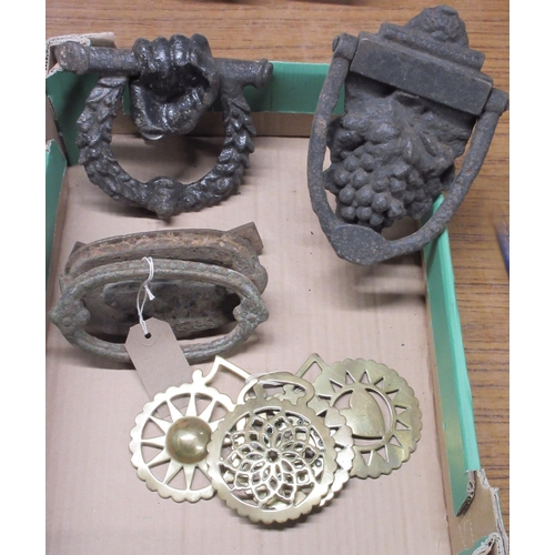 502 - Two Victorian iron door knockers cast as a bunch of grapes and rod in hand, another door knocker and... 