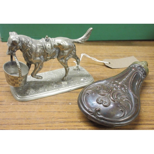 503 - Late 19th century silver plated table cruet modelled as a gun dog carrying a basket in his mouth, on... 