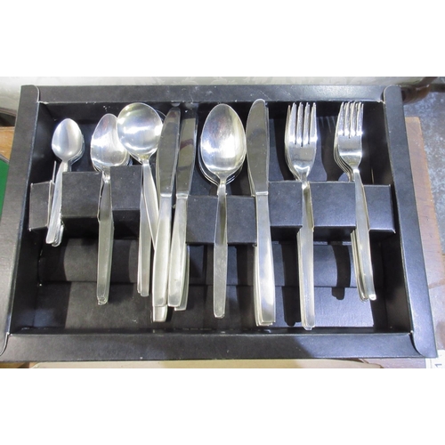 629 - Boxed 44pcs set of stainless steel cutlery, serving board with knife and carving board with spikes, ... 