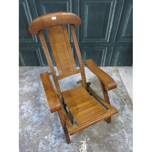 543 - 20th century oak folding steamer chair, solid splat and seat