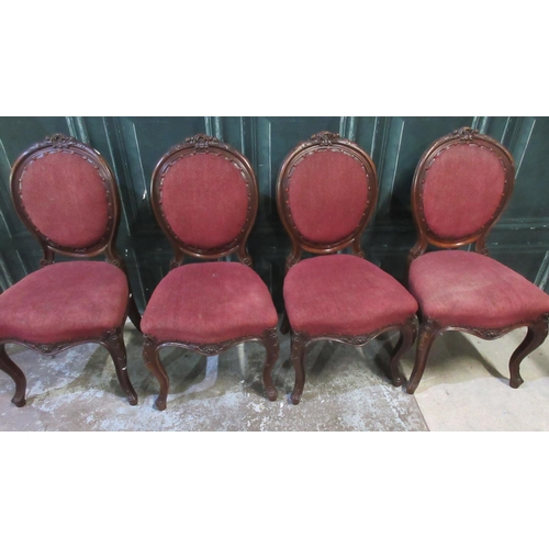 548 - Set of four Victorian carved mahogany framed upholstered Salon chairs, on cabriole legs, (4)