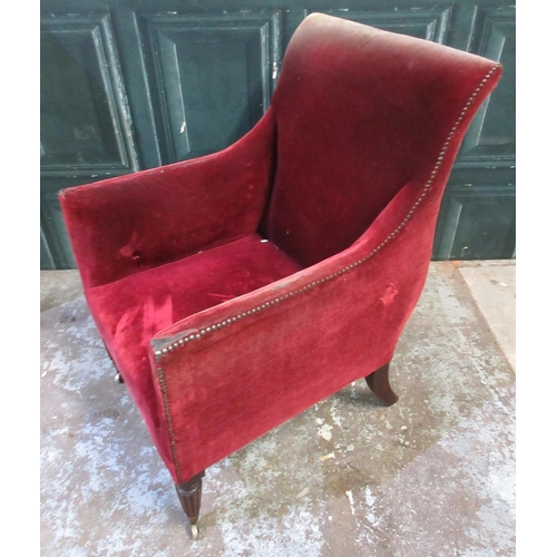 556 - William 1V upholstered arm chair, with curved back and loose seat cushion, on fluted legs with brass... 