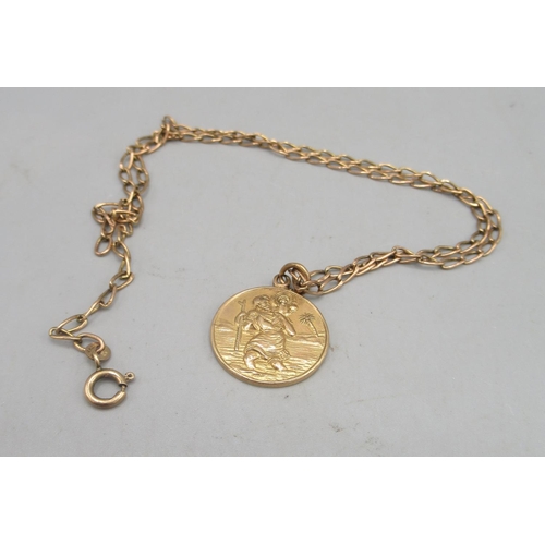 20A - 9ct yellow gold St Christopher pendant with personalised engraving to reverse, on 9ct yellow gold ch... 