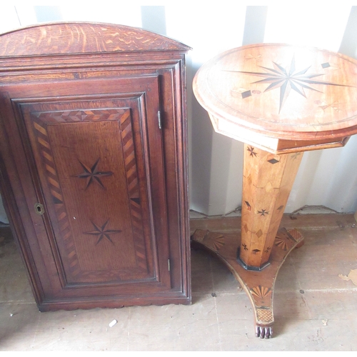 566 - Victorian walnut needlework table, inlaid with stars and geometric shapes, on three paw feet, and a ... 