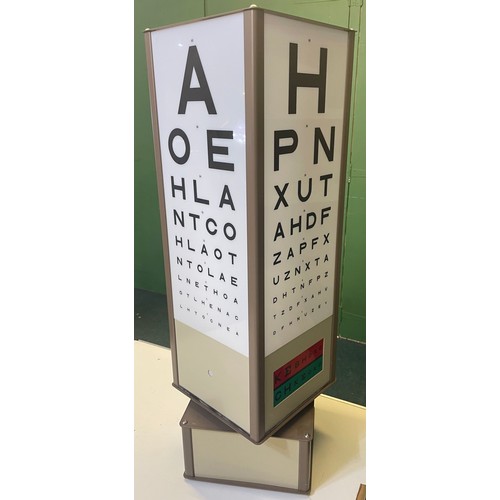 682 - Rotating optometrists eye testing light box manufactured by Gatehouse, H77cm