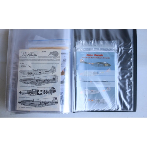 384 - Extensive mixed collection of 1/72 scale model aircraft decals in 3x ring binders including many hig... 