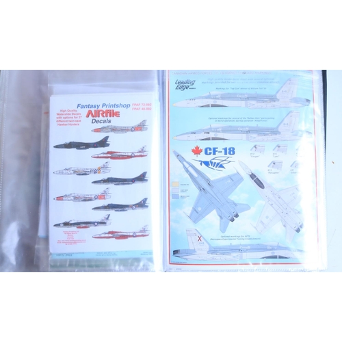 384 - Extensive mixed collection of 1/72 scale model aircraft decals in 3x ring binders including many hig... 