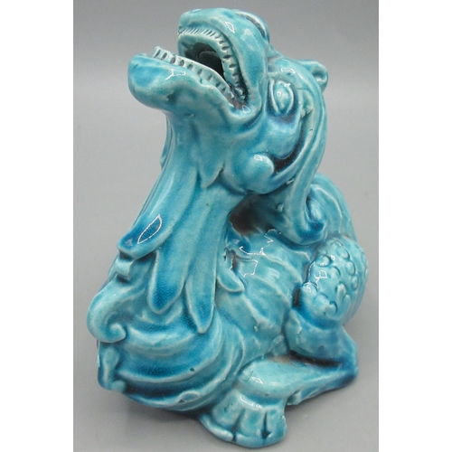 1147 - Burmantofts turquoise glazed Faience model of a dragon, stamped No 1166