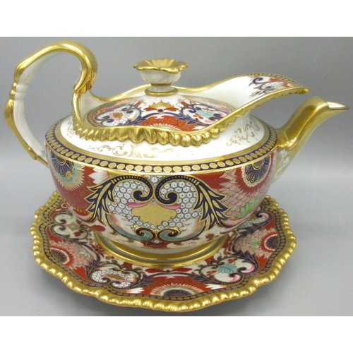 1165 - Early 19th century English porcelain tea pot and cover decorated in Imari pattern with gilt detail a... 