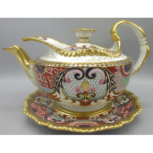 1165 - Early 19th century English porcelain tea pot and cover decorated in Imari pattern with gilt detail a... 