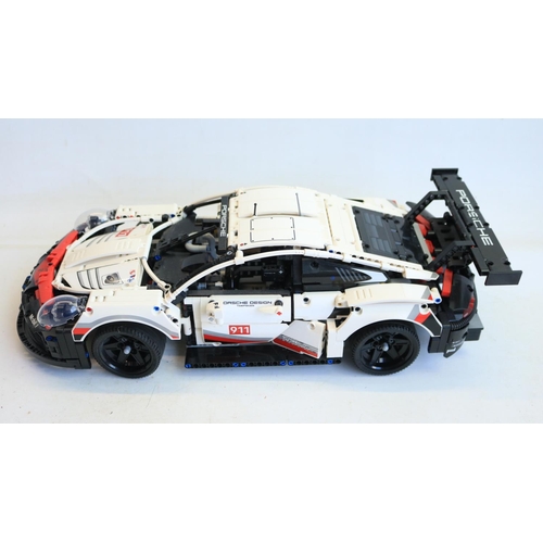 421 - Lego Technic 42096 Porsche 911 RSR, model built up and appears complete, with instruction manual, sp... 