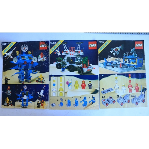 436 - Three vintage early to mid 1980's Lego Space sets to include 6951, 6952 and 6970 Beta Command Post, ... 