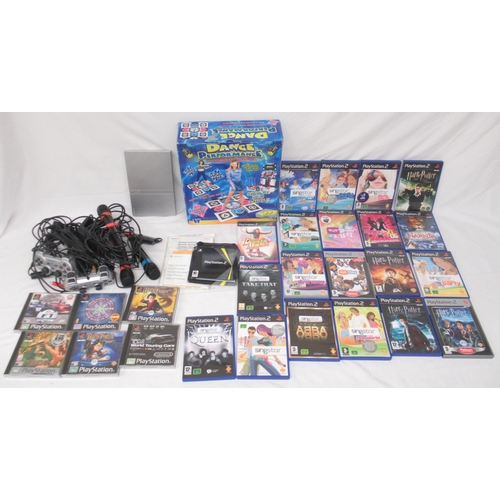 598 - Playstation 2 console, with 2 controllers, Dance Performance Mat, 3 Microphones, 6 PS1 games and 20 ... 