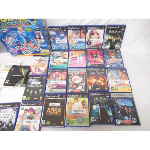 598 - Playstation 2 console, with 2 controllers, Dance Performance Mat, 3 Microphones, 6 PS1 games and 20 ... 