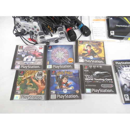 598 - Playstation 2 console, with 2 controllers, Dance Performance Mat, 3 Microphones, 6 PS1 games and 20 ... 