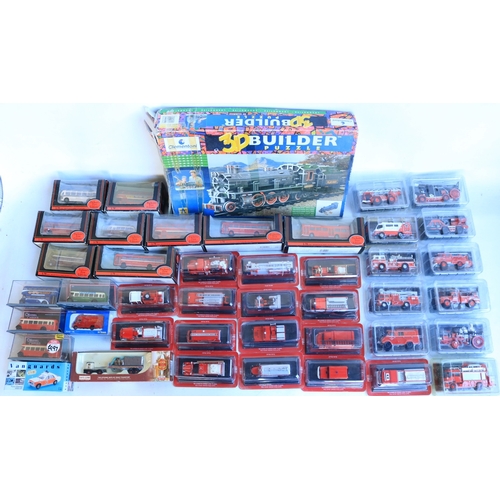 101 - Collection of twenty six sealed magazine issued diecast fire engine models from Del Prado, fifteen b... 