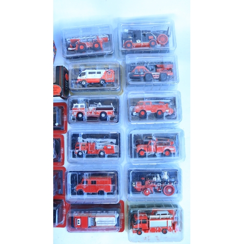 101 - Collection of twenty six sealed magazine issued diecast fire engine models from Del Prado, fifteen b... 