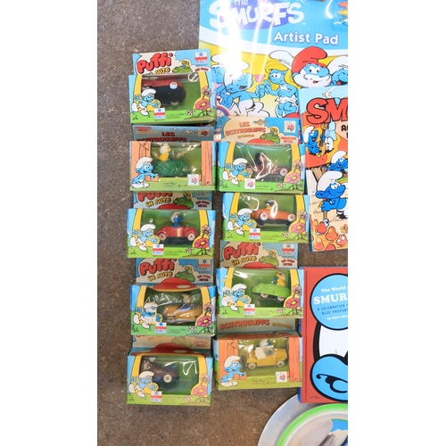 523 - Smurf collection to include soft toys, activity books, figures (including diecast Ertl), cardboard c... 