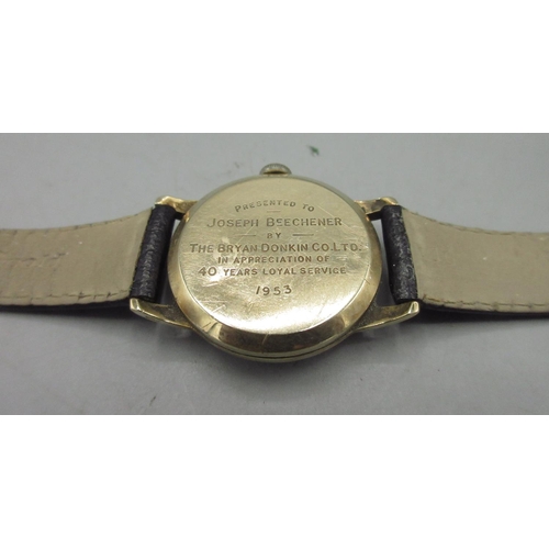 1057 - J. W. Benson, London, 9ct gold wristwatch, signed silvered dial with Roman chapter ring and subsidia... 