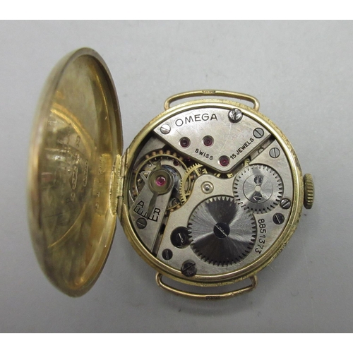 1035 - Ladies Omega 9ct gold wristwatch, signed white enamel Arabic dial with rail track minutes and subsid... 