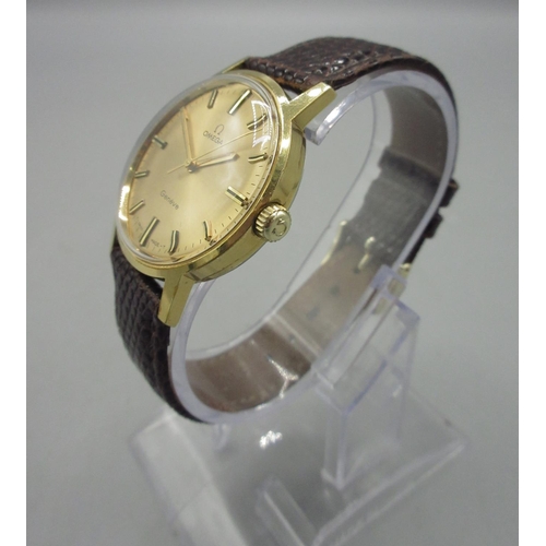 1033 - Omega Genève gold plated wristwatch, signed gold sunburst dial with applied baton indices and centre... 