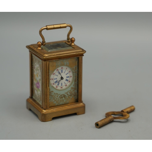 1398 - 20th century French brass 8 day miniature carriage timepiece, plain case set with Serves style flora... 