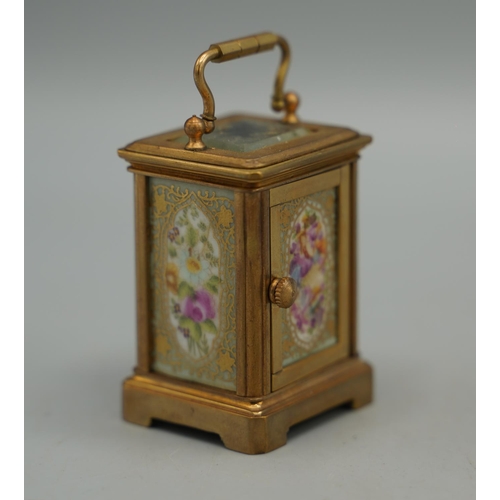 1398 - 20th century French brass 8 day miniature carriage timepiece, plain case set with Serves style flora... 