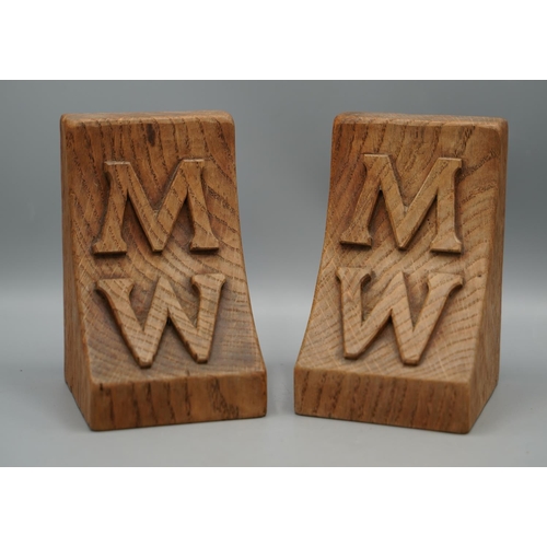 1454 - Robert Mouseman Thompson of Kilburn - a pair of oak bookends, relief carved with initials M.W, incis... 