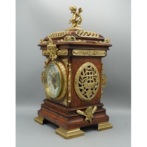 1399 - S. Marti, late 19th century French oak mantle timepiece, moulded case extensively decorated with bra... 