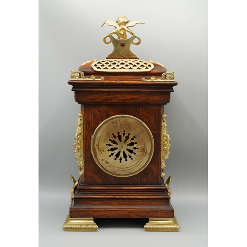 1399 - S. Marti, late 19th century French oak mantle timepiece, moulded case extensively decorated with bra... 