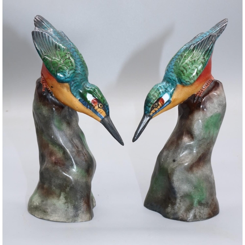 1155 - Pair of continental porcelain models of Kingfishers perched on rocks, decorated in colours, pseudo g... 