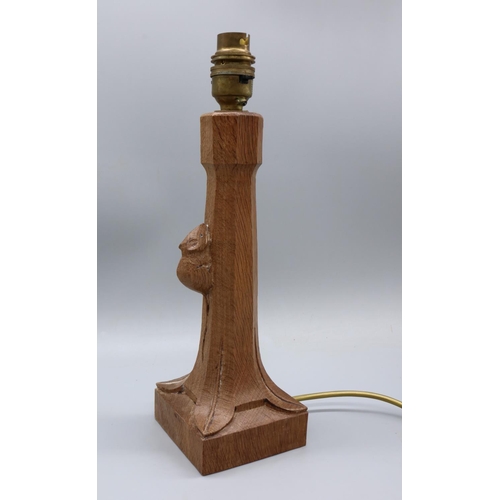 1465 - Robert Mouseman Thompson of Kilburn - an adzed oak table lamp, tapered column on square base, carved... 