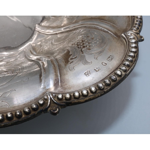 1068 - Victorian silver oval swing handled basket, engraved with C scrolls with beaded border and similar h... 