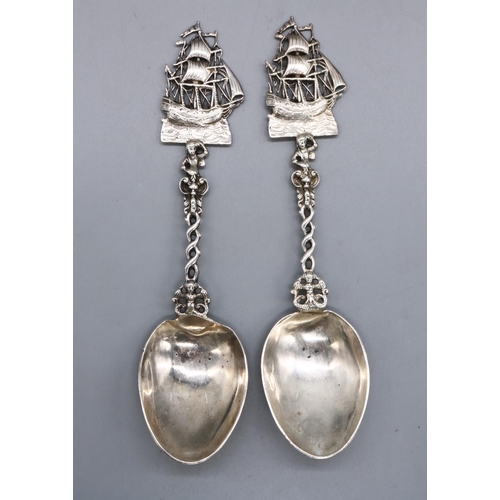 1131 - Pair of foreign silver spoons with galleon finials on twist and cast handles, import marks 925, poss... 