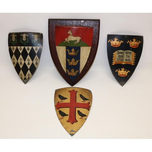 1207 - Collection of tole peinte armorial shields incl. Oxford University crests, one mounted on oak, H25.5... 