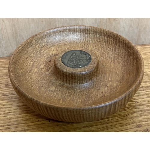 1550 - Lyndon Cat & Mouseman Hammell - an oak circular nut bowl, the raised centre inset with a 1939 Penny,... 