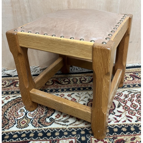 1542 - Carthorse Furniture Thirsk - an oak square footstool, with brass nailed leather upholstered seat on ... 