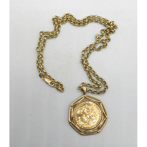 1006 - ER.II 2000 sovereign in ornate 9ct yellow gold mount, on 9ct yellow gold belcher chain, both stamped... 