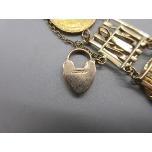 1003 - 9ct yellow gold bar gate bracelet with heart shaped padlock clasp, stamped 9c, set with three sovere... 