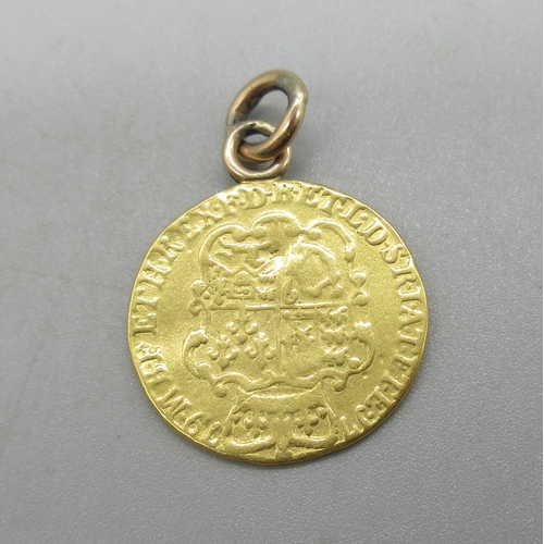 1016 - Geo.III 1779 fourth laur. head r. gold guinea, with soldered yellow metal bail, 8.93g