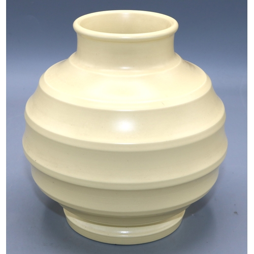 1192 - Keith Murray for Wedgwood, Art Deco ribbed globe vase, glazed in straw yellow, printed KM mark, H16.... 