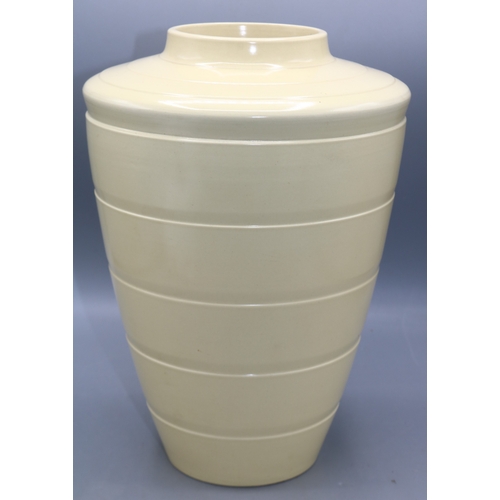 1186 - Keith Murray for Wedgwood, large tapered form high shouldered vase, straw yellow satin glaze, printe... 