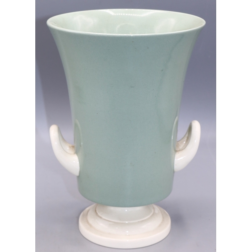 1196 - Keith Murray for Wedgwood, two-tone two-handled urn vase, glazed in celadon green and white, printed... 