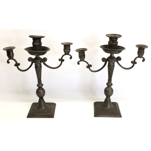 1236 - Pair of Victorian pewter two branch three light candlesticks, scroll arms with urn sconces on flute ... 