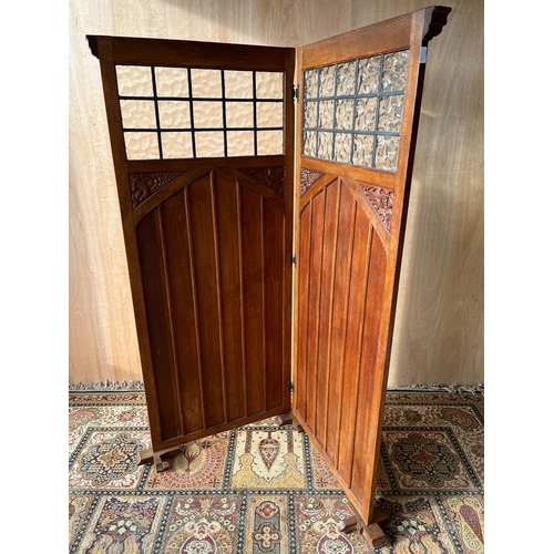 1561 - Victorian Gothic oak single fold screen, the two panels with beaded cornice and lead glazed opaque g... 