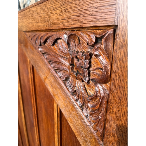 1561 - Victorian Gothic oak single fold screen, the two panels with beaded cornice and lead glazed opaque g... 